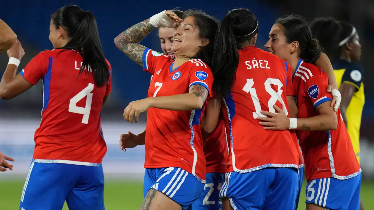 Chile’s Yenny Acuna, second from left, celebrates with teammates after scoring against Ecuador during a Women’s Copa America soccer match in Cali, Colombia, Thursday, July 14, 2022. (AP Photo/Dolores Ochoa)