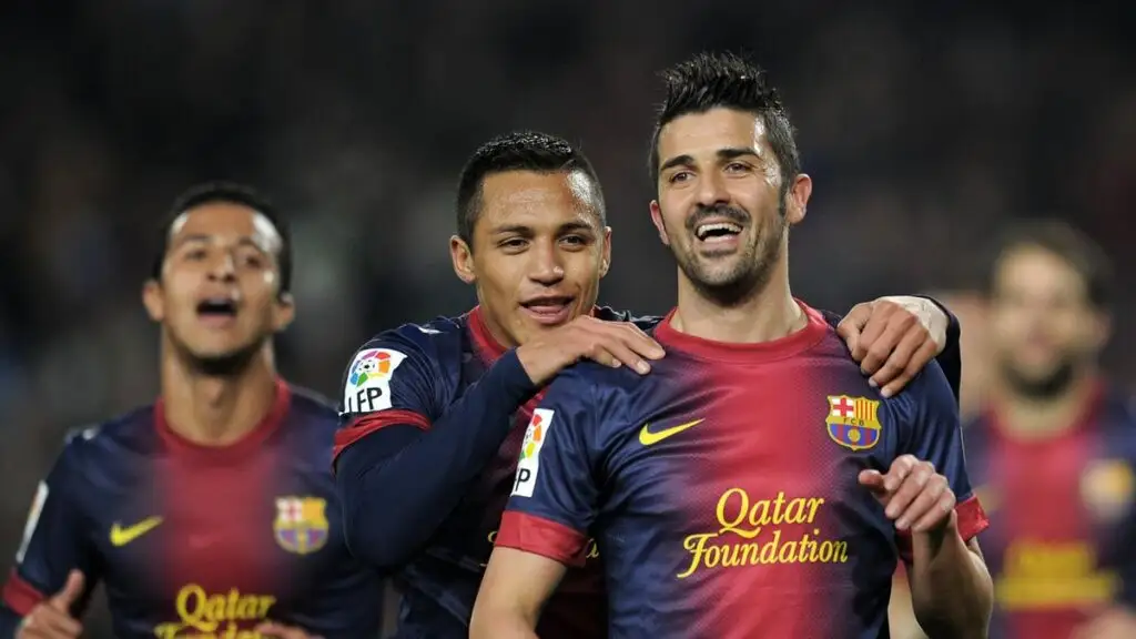 Alexis Sánchez y David Villa fueron compañeros en Barcelona.